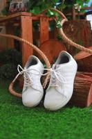 Elegant white wedding shoes photo