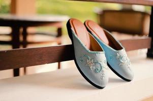 Elegant white wedding shoes photo