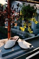 Elegant white wedding shoes photo