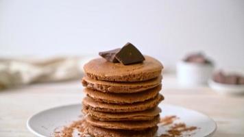 chocolate pancake stack with chocolate powder video