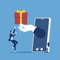 hombre de negocios con la mano sosteniendo una caja de regalo en la pantalla móvil, regalos de un teléfono inteligente, concepto de compra de regalos en línea vector