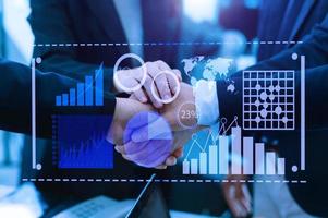 Data Management System with Business Analytics concept. business team hands working with provide information for Key Performance Indicators and marketing analysis onn virtual photo