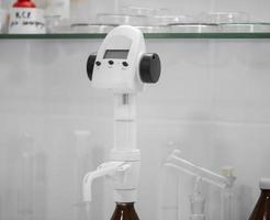 modern devices for analysis and testing of dairy products. test laboratory of a milk factory photo