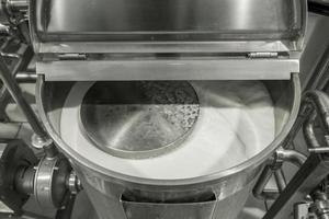 storage and pasteurization tank at the milk factory. equipment at the dairy plant photo