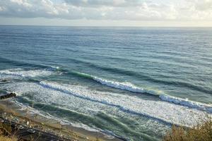 Aerial view of the Tyrrhenian Sea and beautiful beach in Italy. Sand beach and sea view from above. Beach aerial view of sea water and sand shore. photo