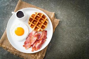 fried egg with bacon and waffle photo