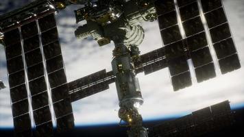 International Space Station over the planet Elements furnished by NASA video