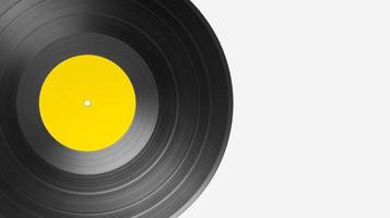 Vinyl record on white background with copy space. Yellow label mock up photo