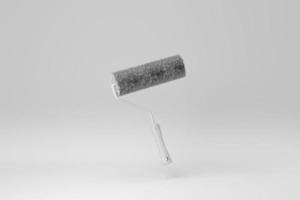 Paint roller isolated on white background. minimal concept. monochrome. 3D render. photo