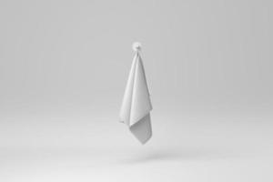 White cotton terry towels hanging on a white background. minimal concept. monochrome. 3D render. photo