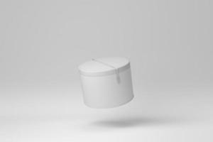 Round gift box with belt on white background. minimal concept. monochrome. 3D render. photo