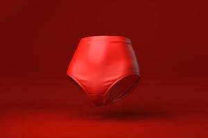 Red Shorts in red background. minimal concept idea creative. monochrome. 3D render. photo