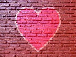 old brick wall graffiti heart, valentines day background photo