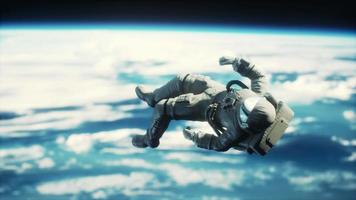 Astronaut in outer space Elements of this image furnished by NASA video