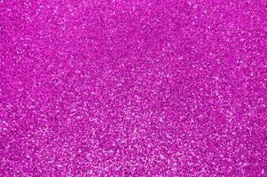 Abstract pink festive sparkle glitter background. photo