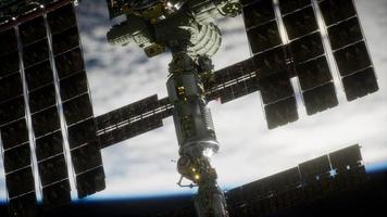 International Space Station over the planet Elements furnished by NASA