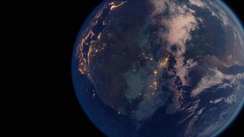 Earth planet viewed from space at night showing the lights of countries photo