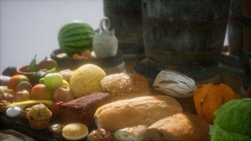 food table with wine barrels and some fruits, vegetables and bread video