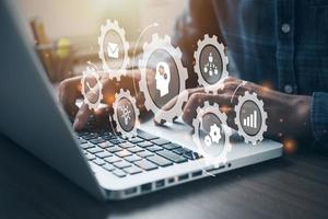 Person working on computer. IOT, Automation, industry 4.0. Information technology in manufacturing concept. photo