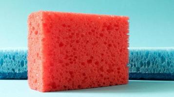 Many blue, red, yellow, green sponges are used to wash and wipe the dirt used by housewives in everyday life. They are made of porous material such as foam. good detergent retention photo