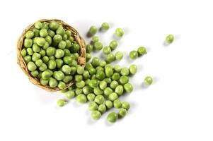 Fresh Green Peas in basket on white background photo