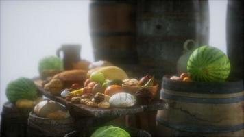 food table with wine barrels and some fruits, vegetables and bread video