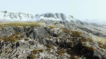 lanscape with barren mountain which is covered with ice video