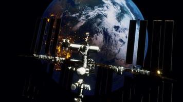 8k international space station on orbit of the Earth. Elements furnished by NASA video