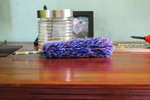 Feather duster and jar photo