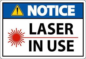 aviso láser en uso signo de símbolo sobre fondo blanco vector