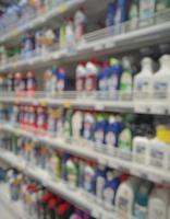 Blurred passage of a supermarket with shelves with goods. abstract passage in the supermarket with colorful goods on the shelves, can be used as a background or for your other project photo