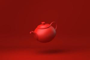 Red Teapot floating in Red background. minimal concept idea creative. monochrome. 3D render. photo