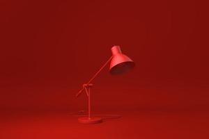 lámpara de escritorio roja de fondo rojo. idea de concepto mínimo creativo. monocromo. procesamiento 3d foto