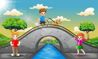 niños felices jugando en el puente