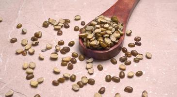 Green Mung Beans Also Know as Mung Dal, Vigna Radiata, Green Beans or Moong Dal isolated on White Background photo