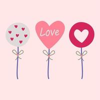 Lollipops on a stick in the shape of hearts. vector