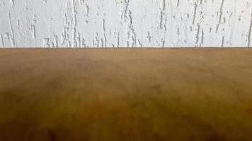 Empty top of a natural wooden table and retro white decorative wall. To display the product. Wooden table and white wall. Empty wooden tabletop, counter, shelf in the wall of the room photo