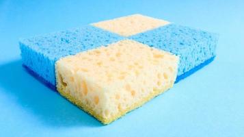 Many blue, red, yellow, green sponges are used to wash and wipe the dirt used by housewives in everyday life. They are made of porous material such as foam. good detergent retention photo