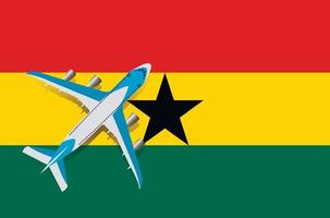 Vector Illustration of a passenger plane flying over the flag of Ghana. Concept of tourism and travel