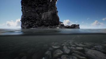 ocean seascape with sky and ocean wave splitted by waterline to underwater part photo