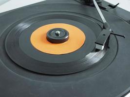 Vinyl record on turntable photo