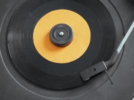 Vinyl record on turntable photo