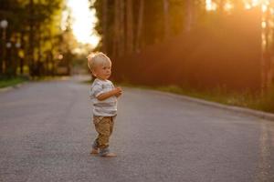 Cute boy with blond hair and blue eyes photo