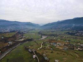 Aerial view of Baijnath City. Drone shot of Bageshwar district. A city situated in between the mountains photo