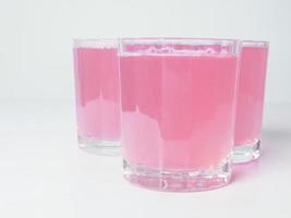 Saft de pomelo rosa foto