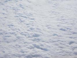 Clouds seen from plane background photo