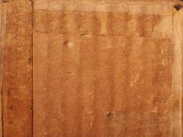 Grunge brown cardboard background photo