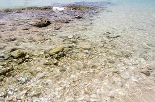 un fondo de arena blanca en salento hermosa playa de arena, italia foto