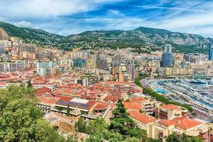 View over luxury yachts and apartments in Monte Carlo, Monaco photo