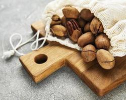 Pecan nuts on table photo